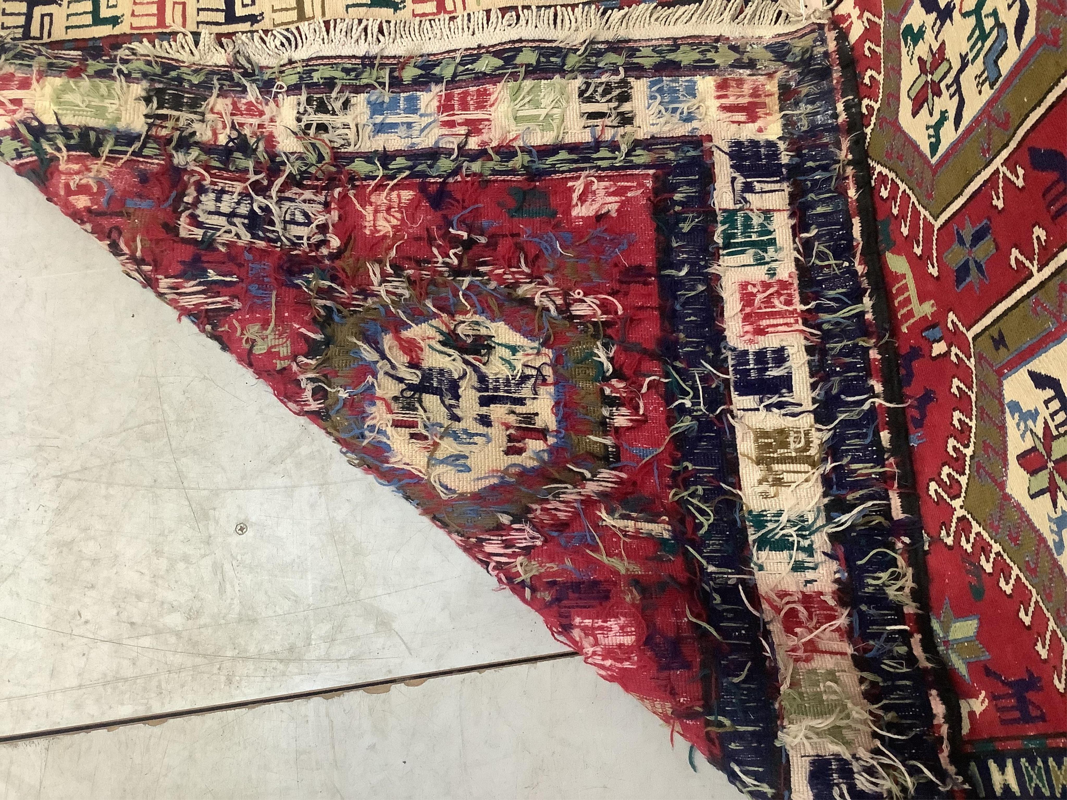 A Soumak flatweave rug, approximately 320 x 108cm. Condition - good